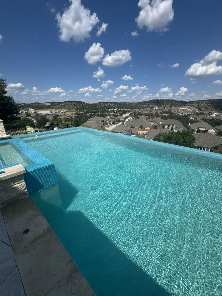 Swimming pool cleaning pictures Austin – LSI balanced
